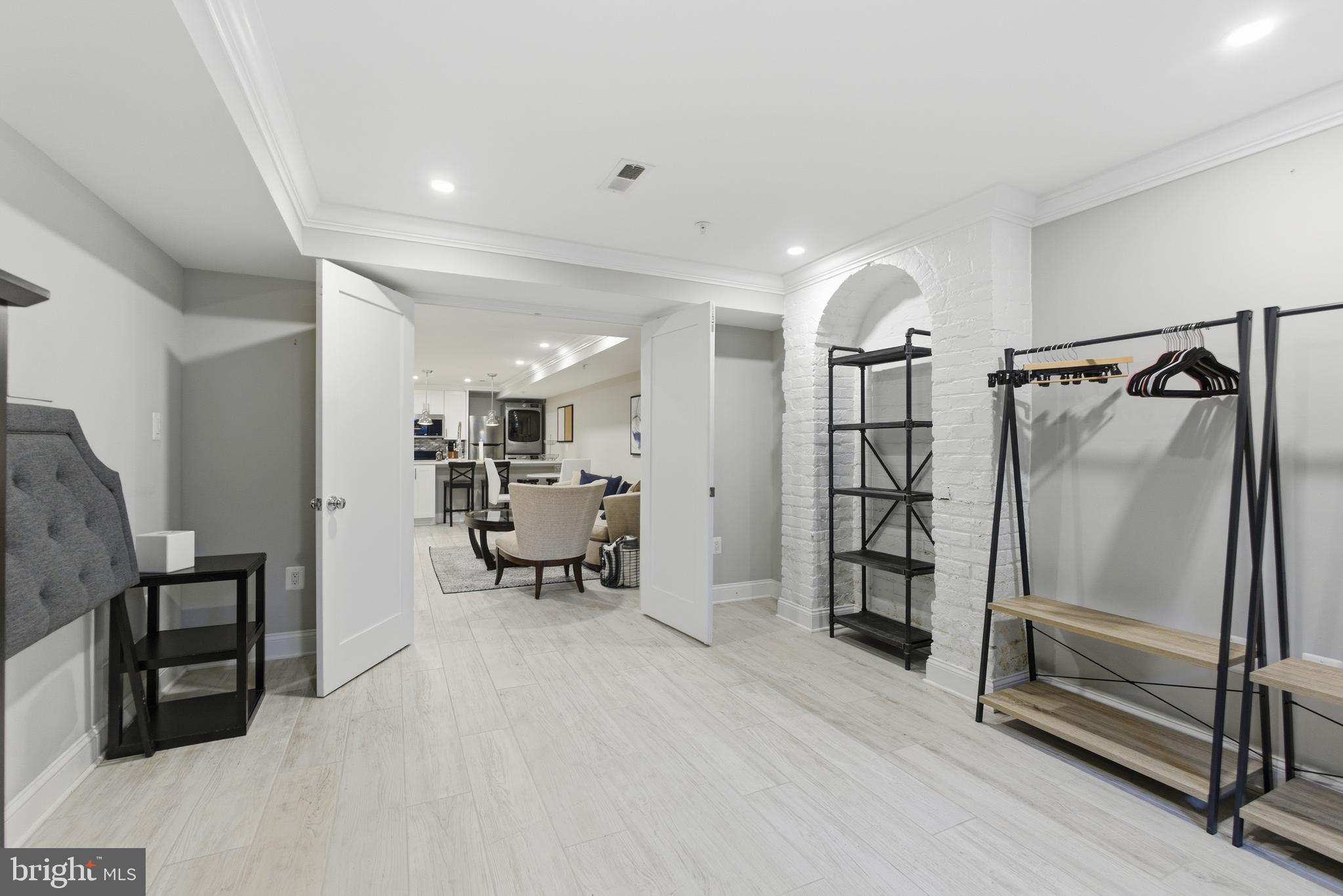 1748 S Street Northwest, Unit 2 Washington, DC 20009 - Photo 9 of 33 a view of a hallway with workspace and a window