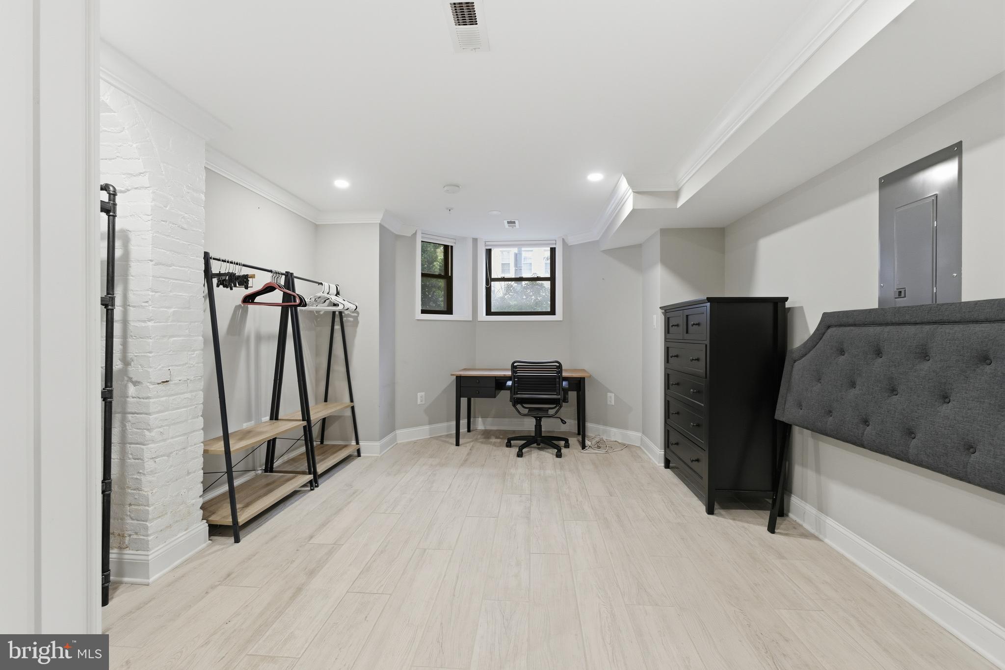 1748 S Street Northwest, Unit 2 Washington, DC 20009 - Photo 10 of 33 a view of a livingroom with furniture and a flat screen tv