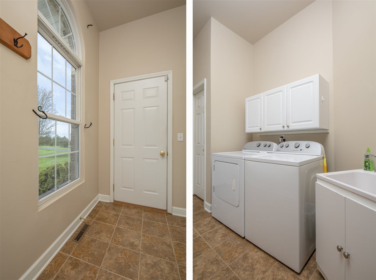 6300 Quail Trap Road Poplar Grove, IL 61065 - Photo 28 of 34 a view of utility room with washer and dryer
