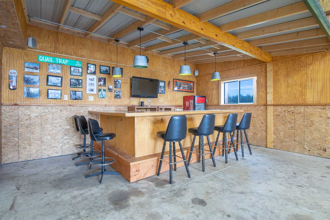 6300 Quail Trap Road Poplar Grove, IL 61065 - Photo 31 of 34 a view of a dining room with furniture and a table