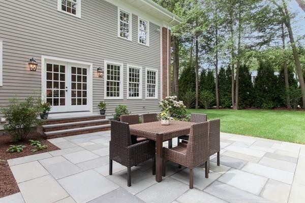 15 Cedar Road Brookline, MA 02467 - Photo 14 of 14 a view of a house with backyard and sitting area