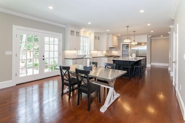 15 Cedar Road Brookline, MA 02467 - Photo 3 of 14 a dining room with furniture and wooden floor