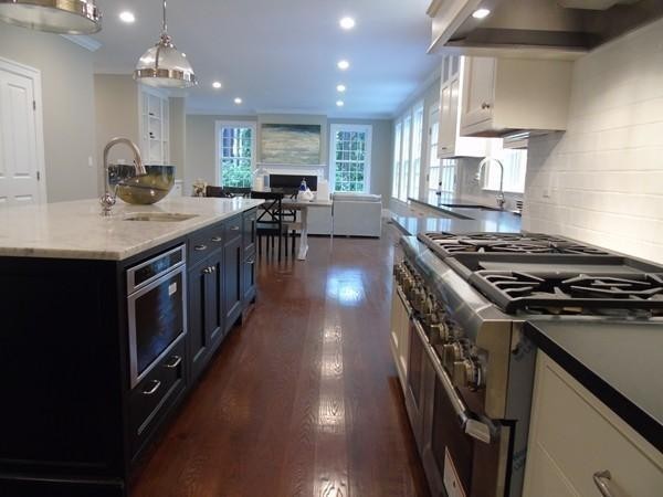 15 Cedar Road Brookline, MA 02467 - Photo 4 of 14 a kitchen with stove and a sink