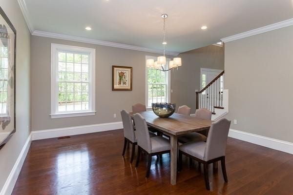 15 Cedar Road Brookline, MA 02467 - Photo 7 of 14 a view of a dining room with furniture and wooden floor