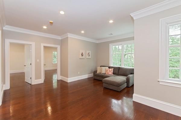 15 Cedar Road Brookline, MA 02467 - Photo 9 of 14 a living room with furniture and a large window