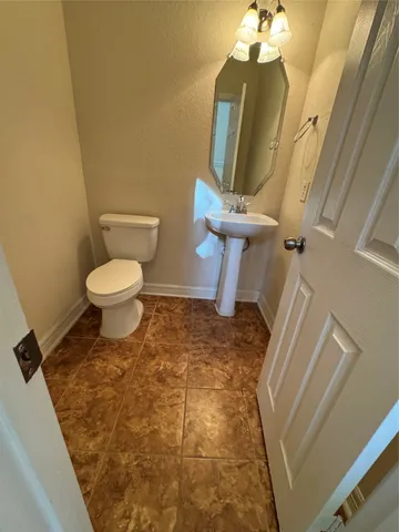 a bathroom with a toilet