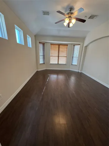 a en suite bathroom with a sink a tub and a mirror