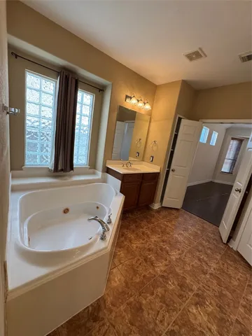 a view of front door with wooden floor