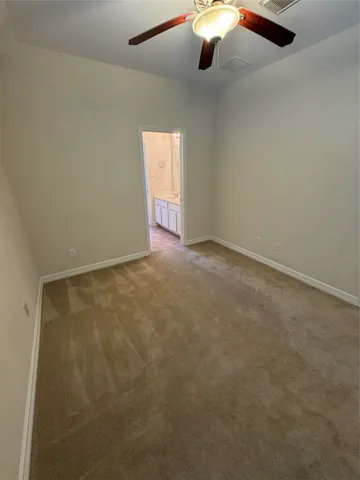 a bathroom with a double vanity sink a mirror and a shower