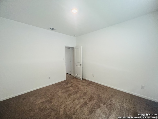 32141 Morels Avenue Bulverde, TX 78163 - Photo 15 of 22 an empty room with an entryway