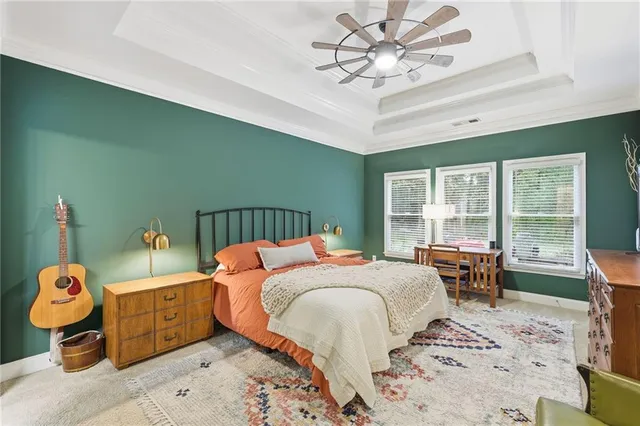 a bathroom with a tub and a window