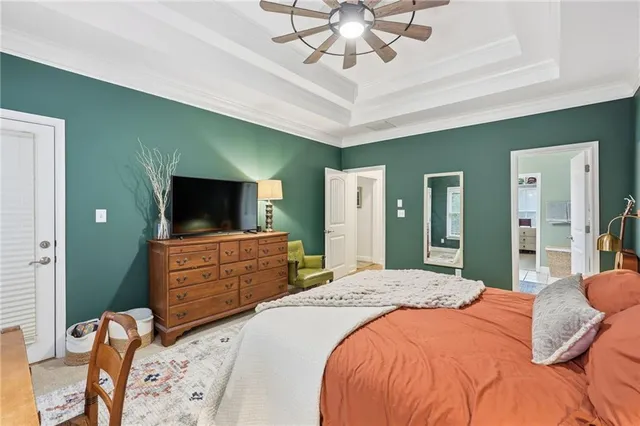 a large bathroom with a tub and shower