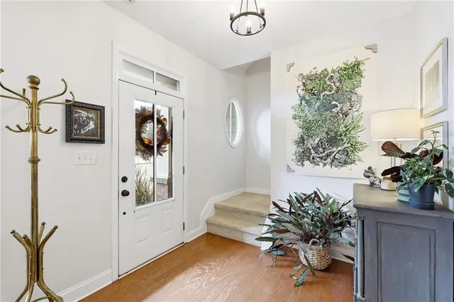 a bed room with a bed and a chair