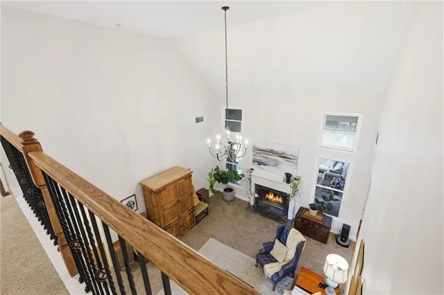 a bathroom with a sink toilet and shower curtain