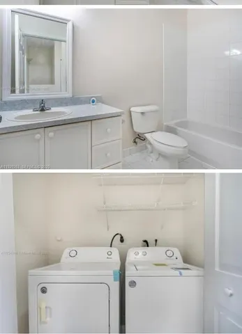 a view of a parking area with wooden fence