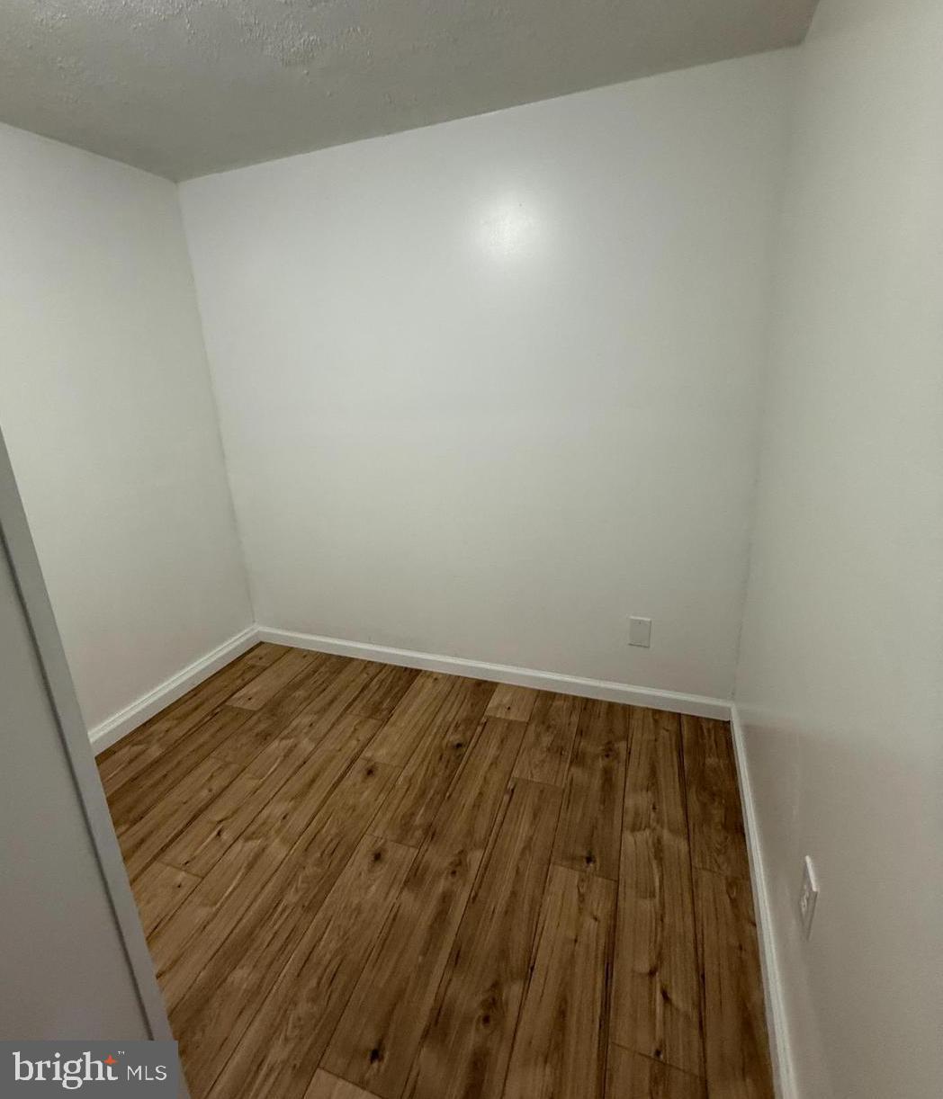 111 Branch Street Berlin, MD 21811 - Photo 10 of 14 Closet or office with new flooring and walls