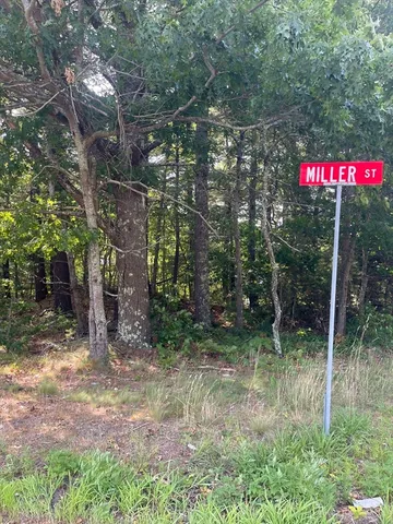 a sign that is on the side of a road