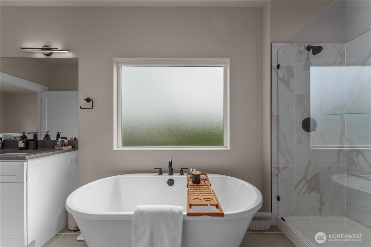 214 Solomon Loop Northwest East Wenatchee, WA 98802 - Photo 20 of 38 a white bath tub sitting next to a white toilet