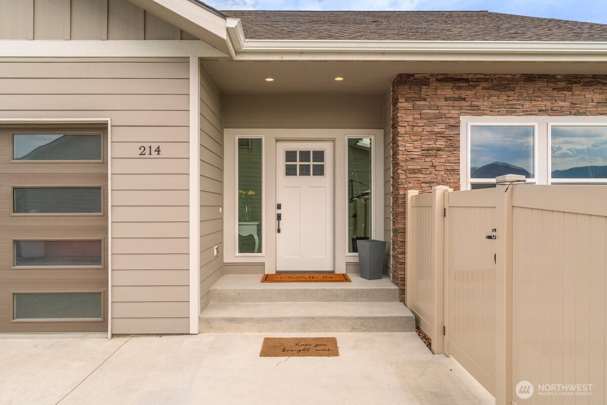 214 Solomon Loop Northwest East Wenatchee, WA 98802 - Photo 2 of 38 a view of a entryway door of the house