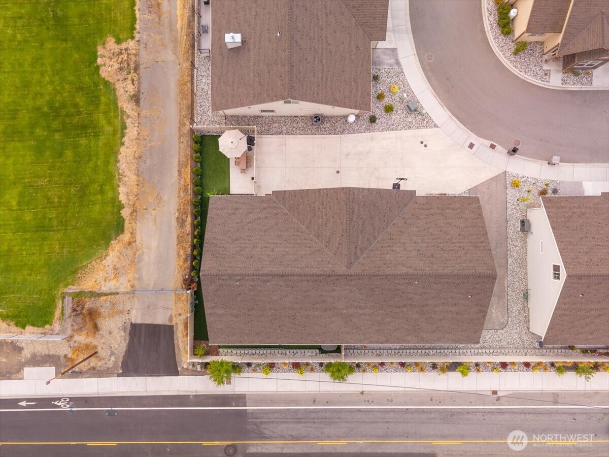 214 Solomon Loop Northwest East Wenatchee, WA 98802 - Photo 32 of 38 an aerial view of a house with a swimming pool