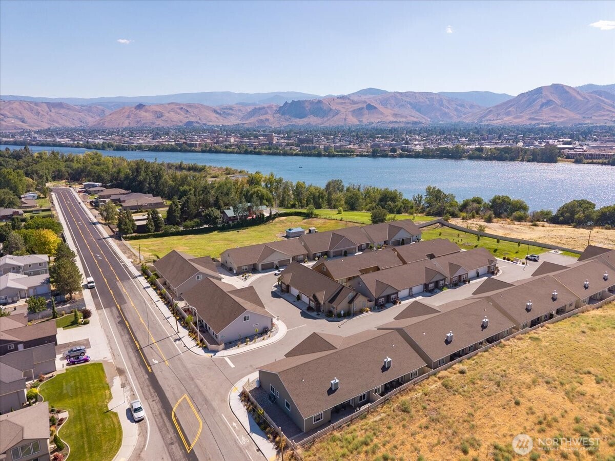 214 Solomon Loop Northwest East Wenatchee, WA 98802 - Photo 34 of 38 a view of a swimming pool with a table and chairs