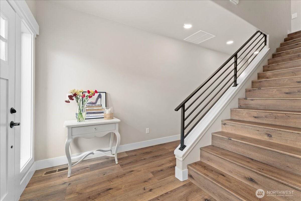 214 Solomon Loop Northwest East Wenatchee, WA 98802 - Photo 5 of 38 a view of entryway and hall with wooden floor