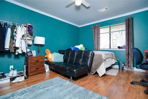 a bathroom with a sink toilet and mirror