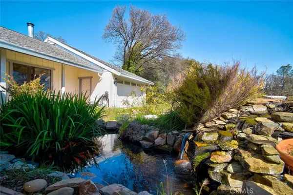 a backyard of a house with seating space