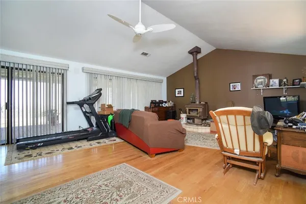 a kitchen with granite countertop cabinets stainless steel appliances a sink and a window