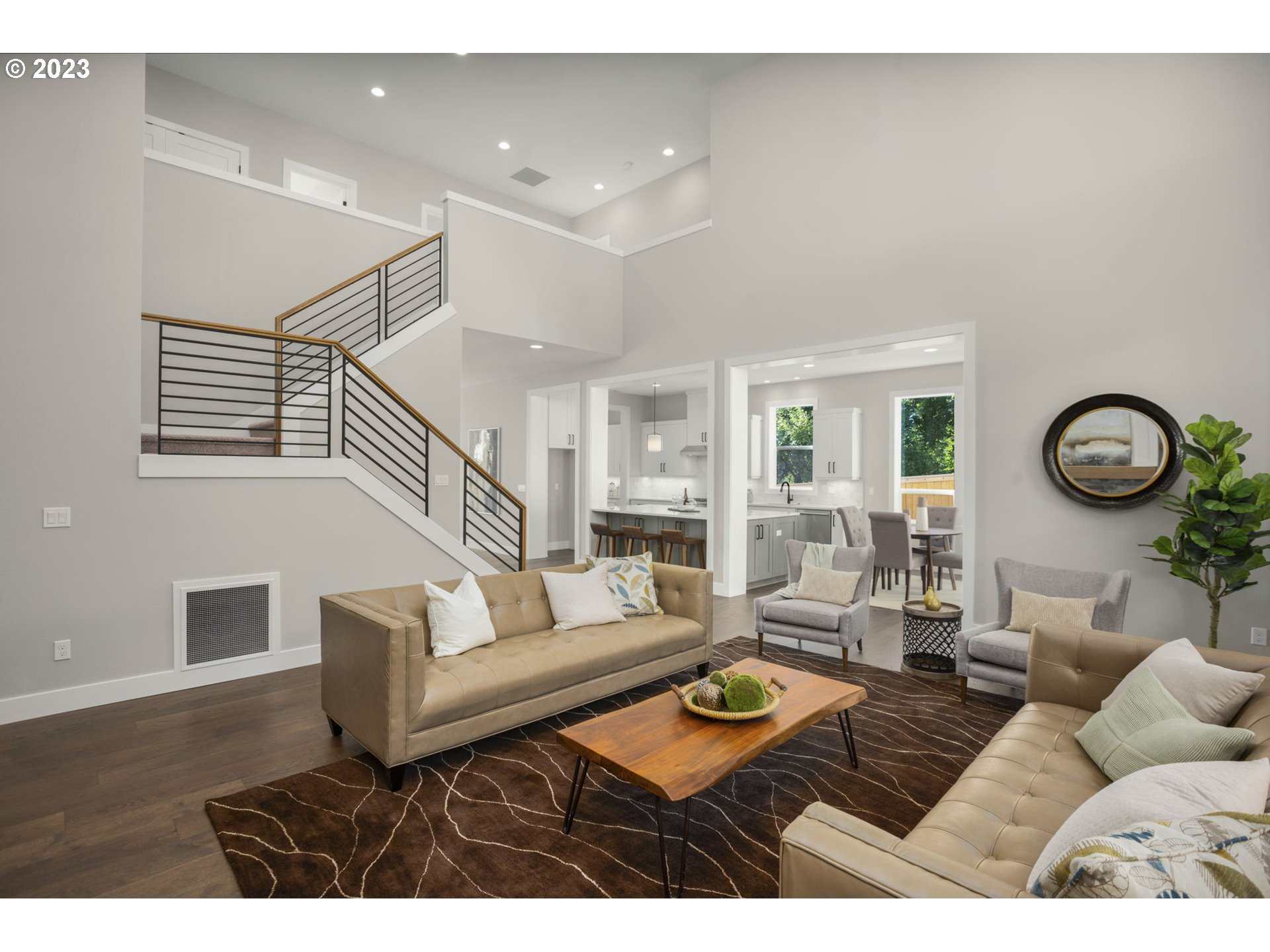 8878 Southwest Lintner Terrace Portland, OR 97223 - Photo 11 of 42 a living room with furniture and a wooden floor