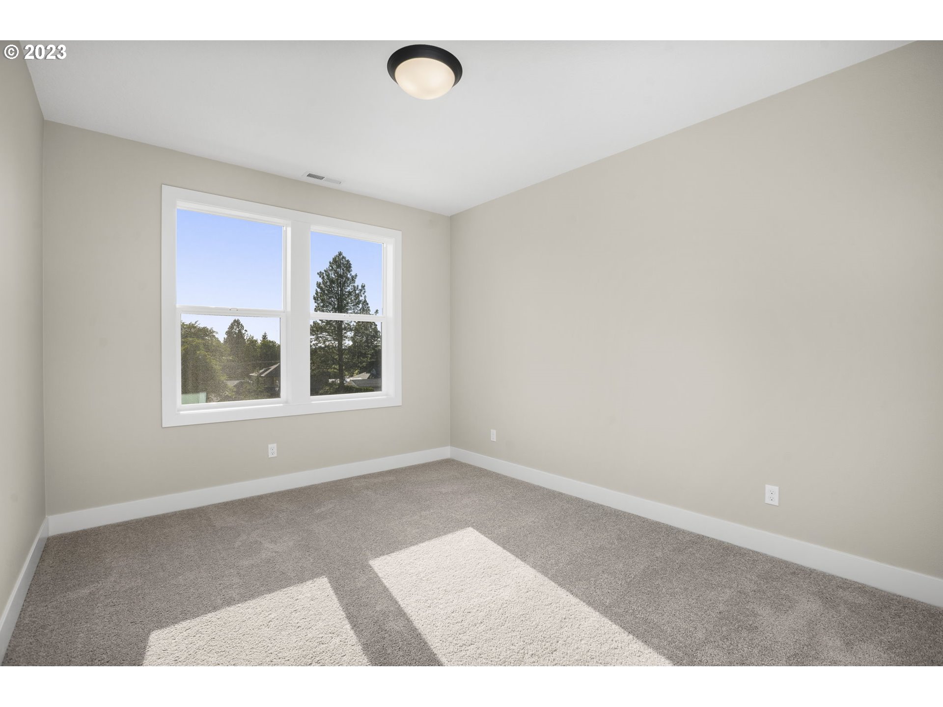 8878 Southwest Lintner Terrace Portland, OR 97223 - Photo 23 of 42 an empty room with windows
