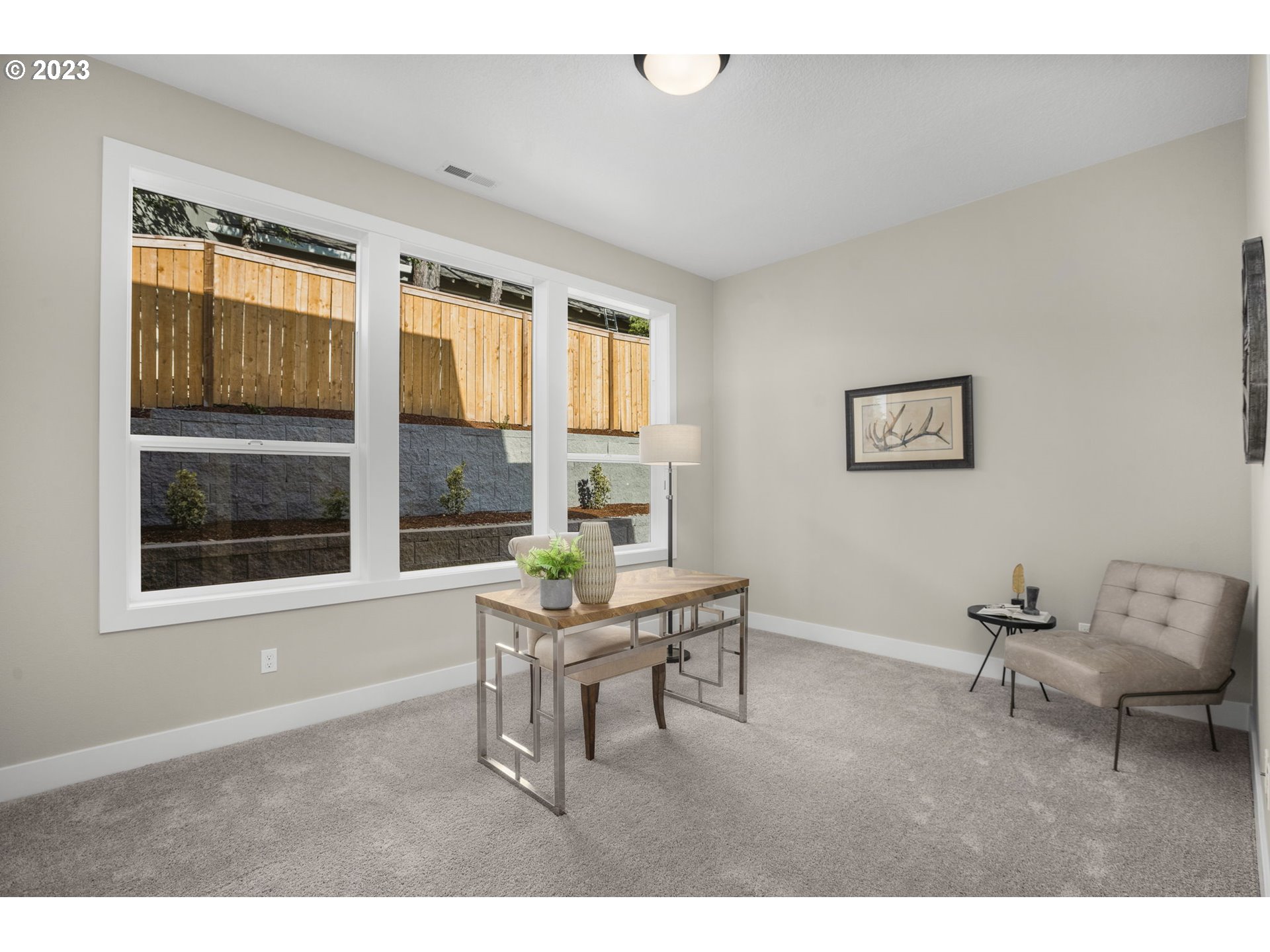 8878 Southwest Lintner Terrace Portland, OR 97223 - Photo 28 of 42 a work room with furniture and windows