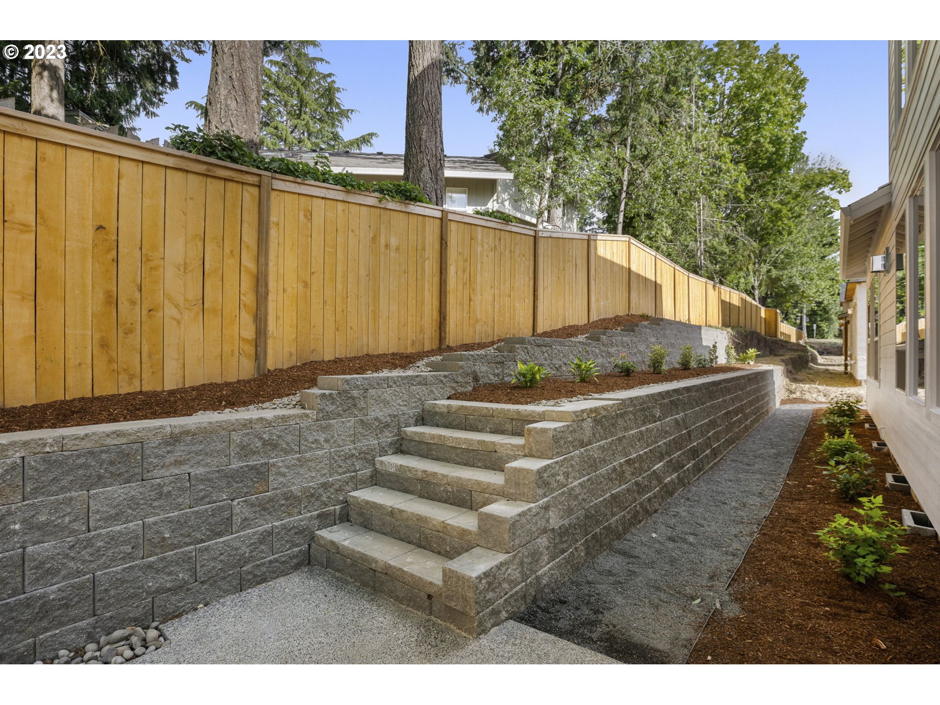 8878 Southwest Lintner Terrace Portland, OR 97223 - Photo 32 of 42 a view of a backyard with pathway