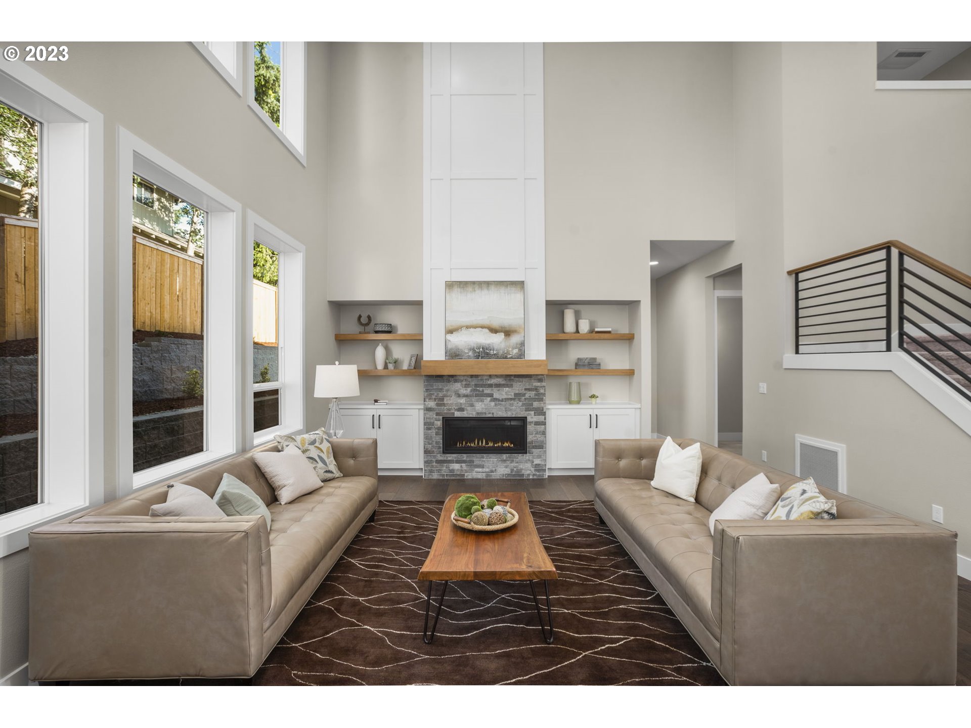8878 Southwest Lintner Terrace Portland, OR 97223 - Photo 5 of 42 a living room with furniture and a fireplace