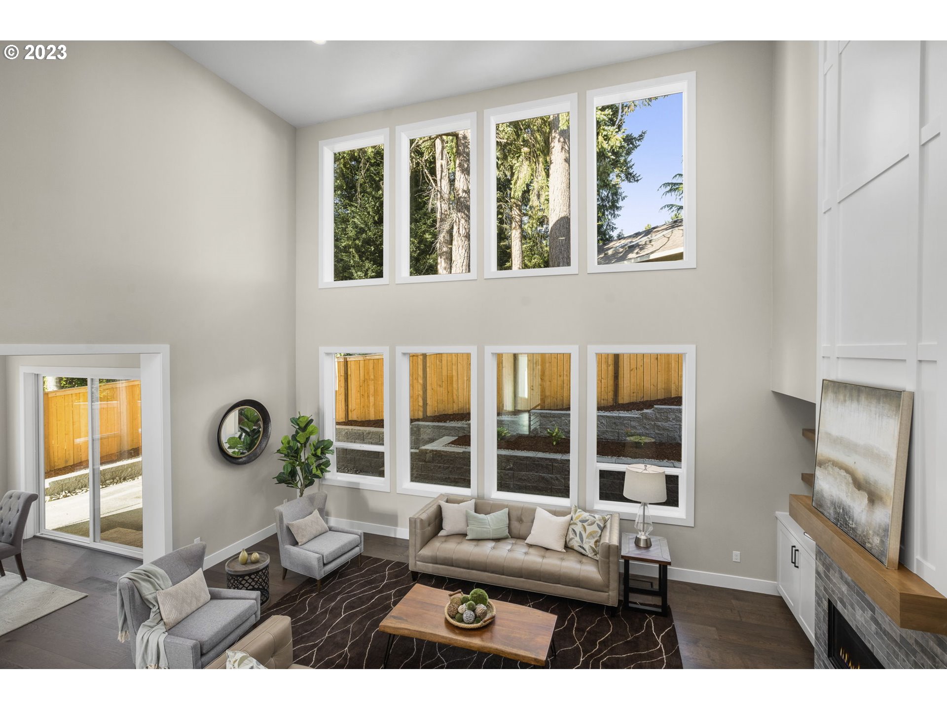 8878 Southwest Lintner Terrace Portland, OR 97223 - Photo 8 of 42 a living room with furniture and next to a window