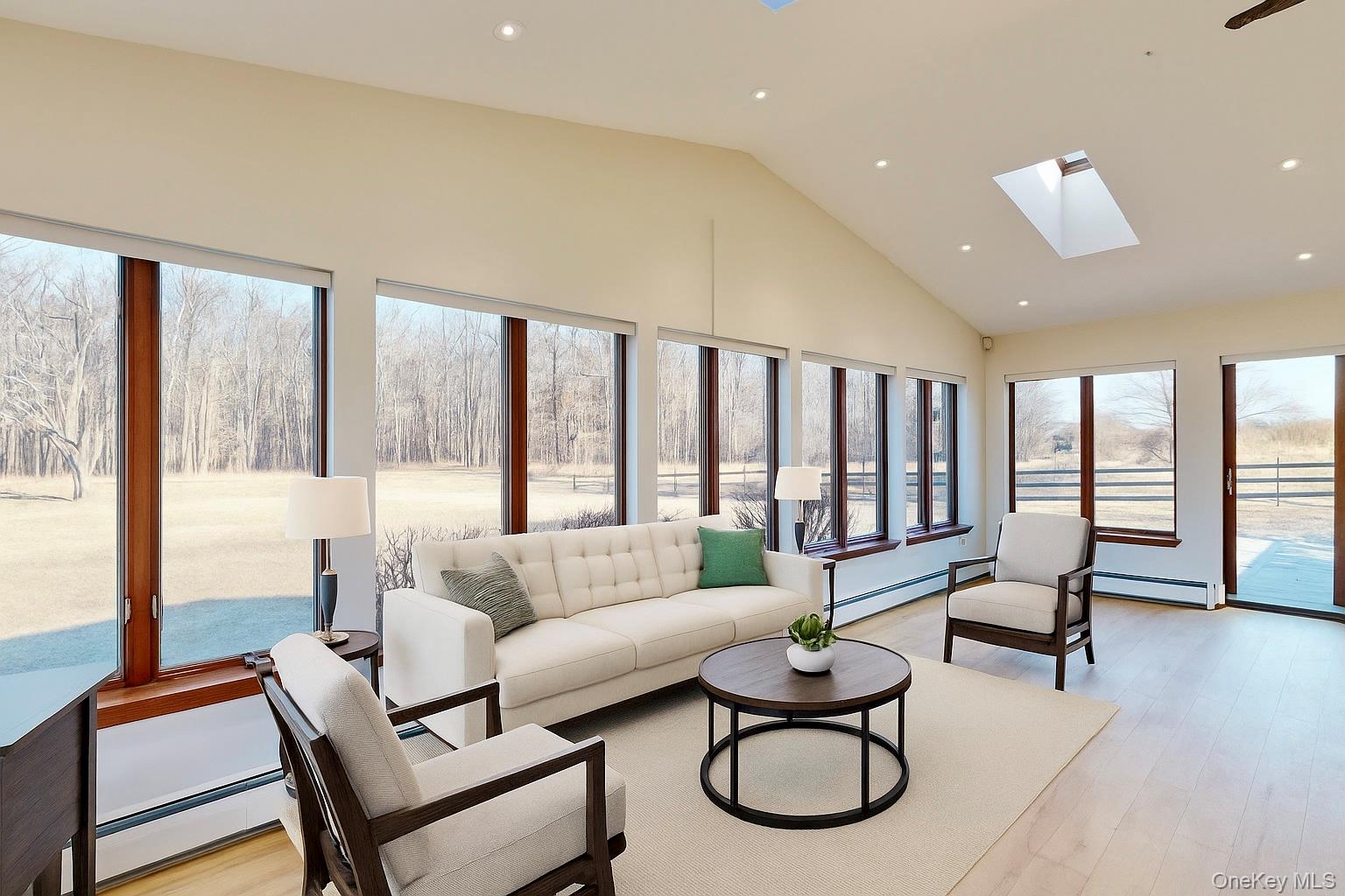 565 Prosperous Valley Road Middletown, NY 10940 - Photo 23 of 47 a living room with furniture and floor to ceiling window