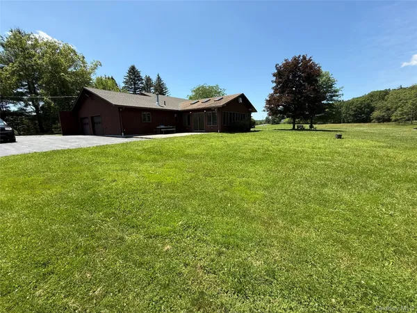a view of an outdoor space and a yard