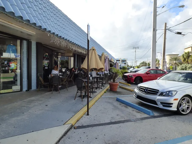 a view of outdoor space with garden and seating area