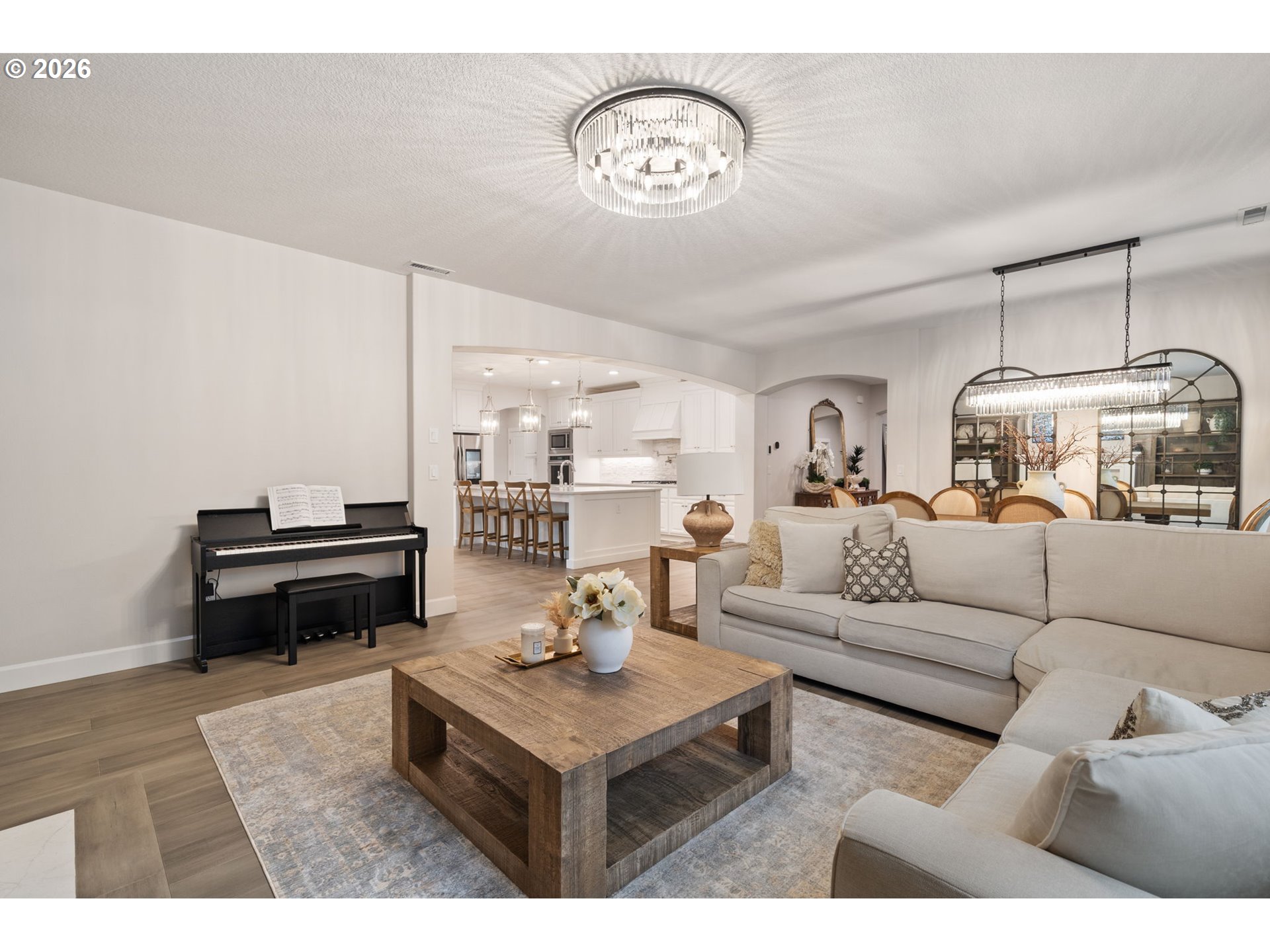 4024 South Winery Way Ridgefield, WA 98642 - Photo 13 of 48 a living room with furniture a rug and a clock