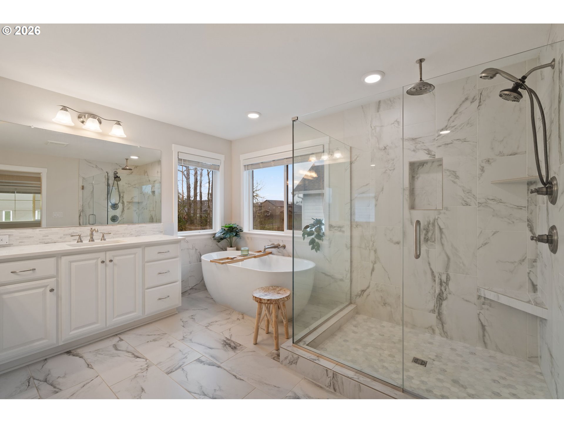 4024 South Winery Way Ridgefield, WA 98642 - Photo 30 of 48 a bathroom with a granite countertop sink mirror and shower