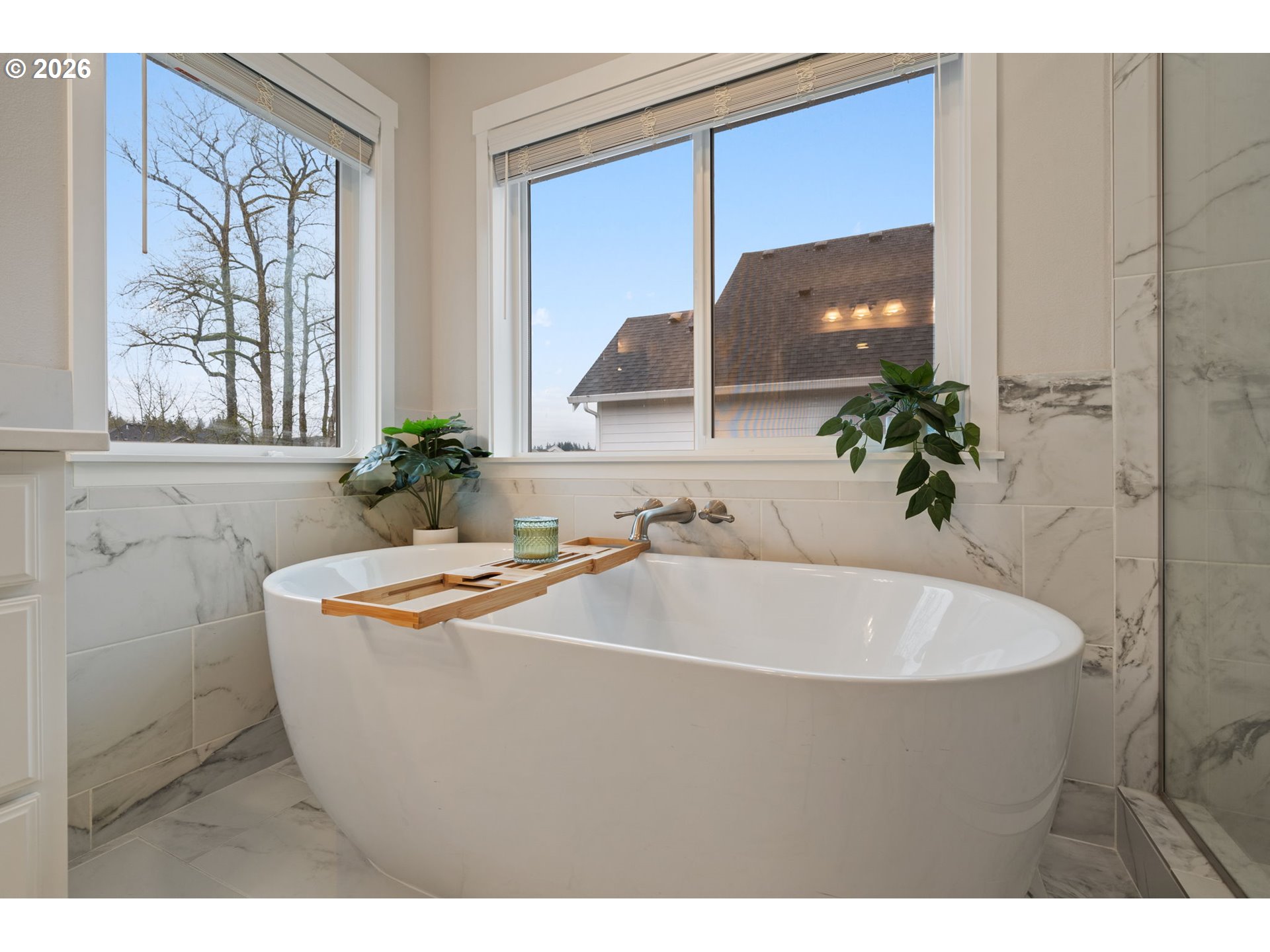 4024 South Winery Way Ridgefield, WA 98642 - Photo 32 of 48 a bathroom with a tub sink and mirror