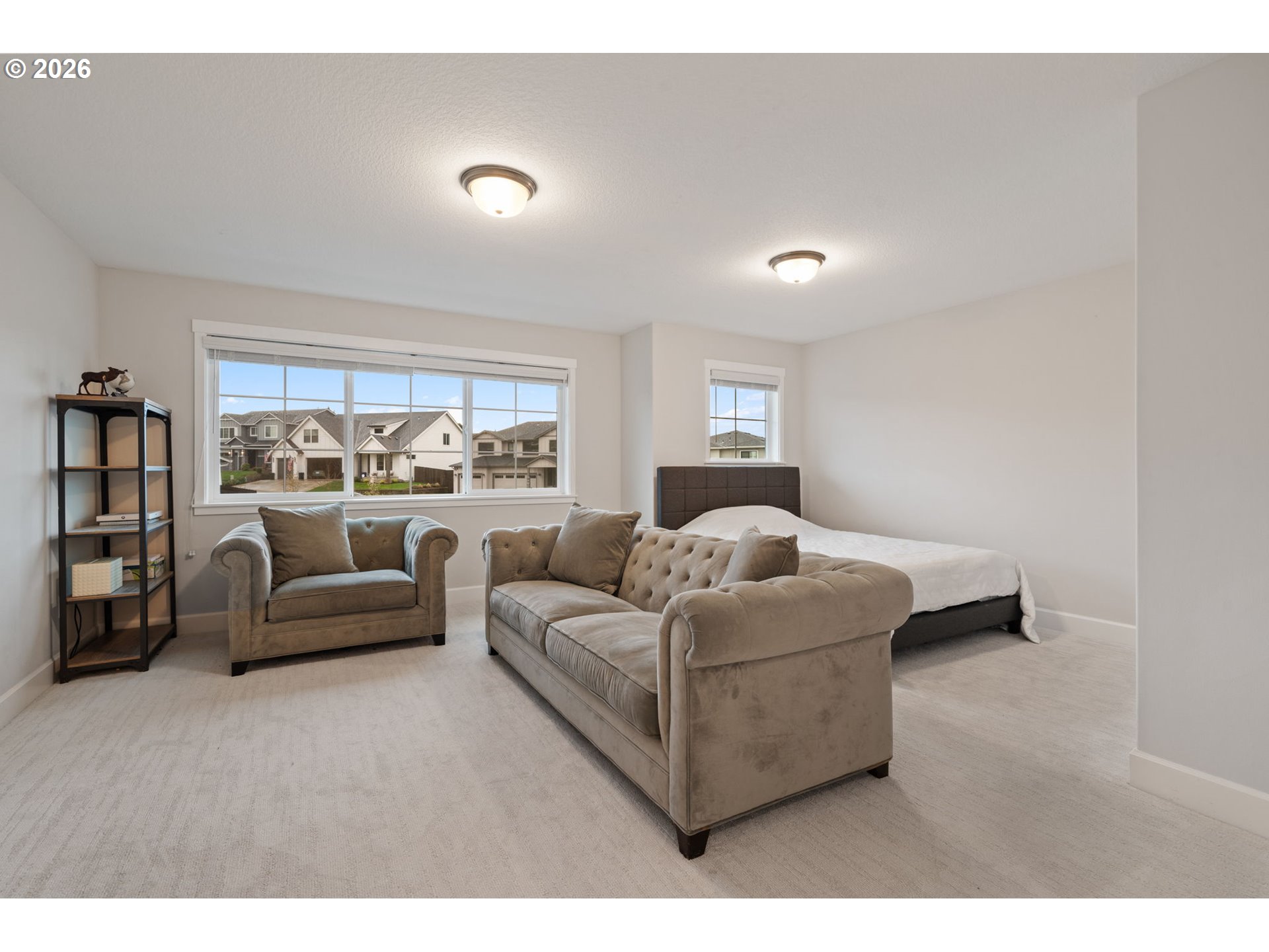 4024 South Winery Way Ridgefield, WA 98642 - Photo 33 of 48 a living room with furniture and a large window