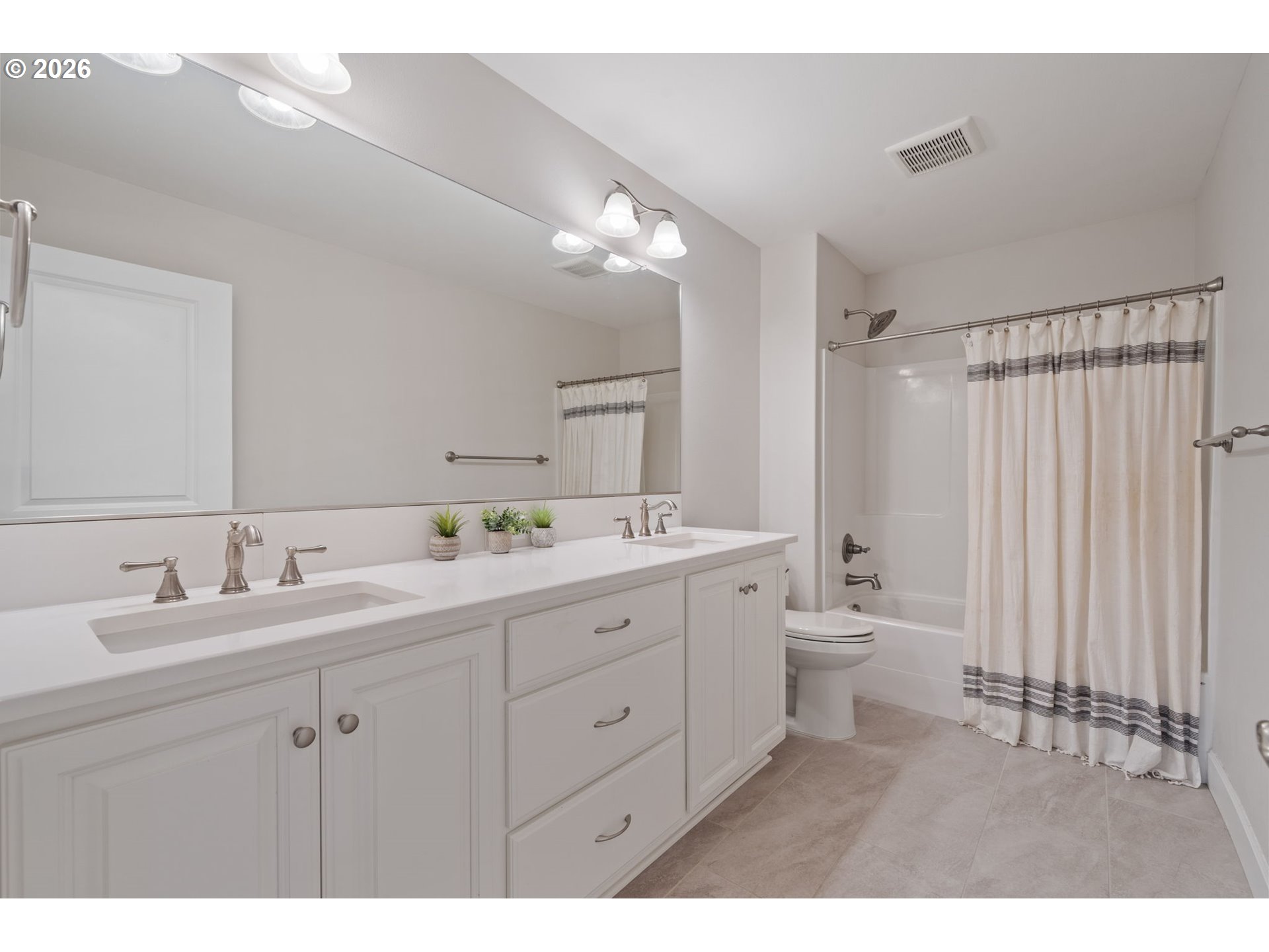 4024 South Winery Way Ridgefield, WA 98642 - Photo 37 of 48 a bathroom with a double vanity sink mirror and toilet