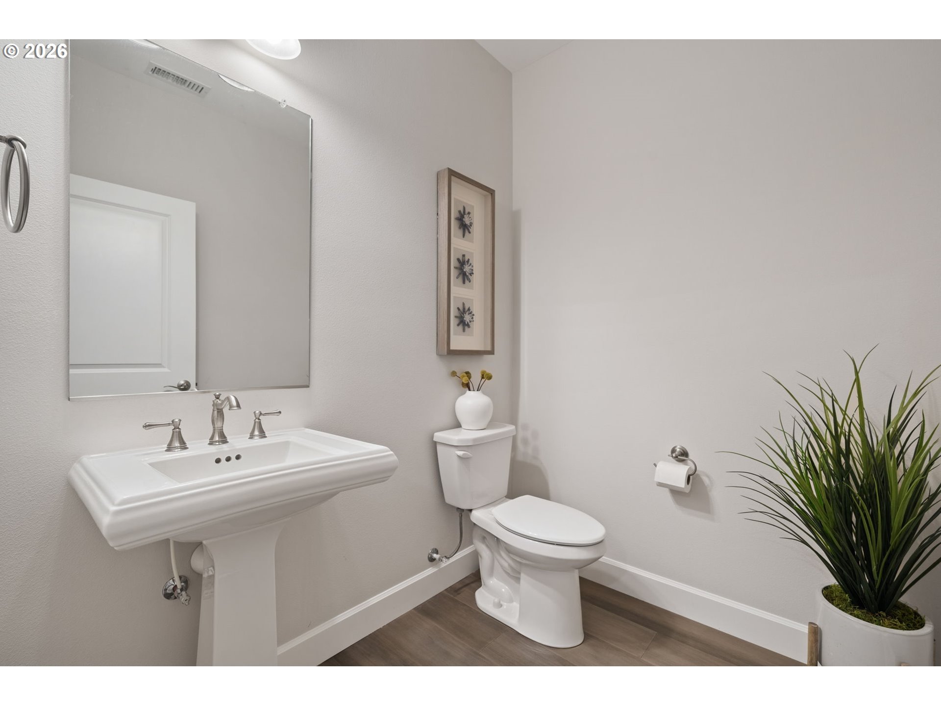 4024 South Winery Way Ridgefield, WA 98642 - Photo 5 of 48 a bathroom with a sink toilet and a mirror