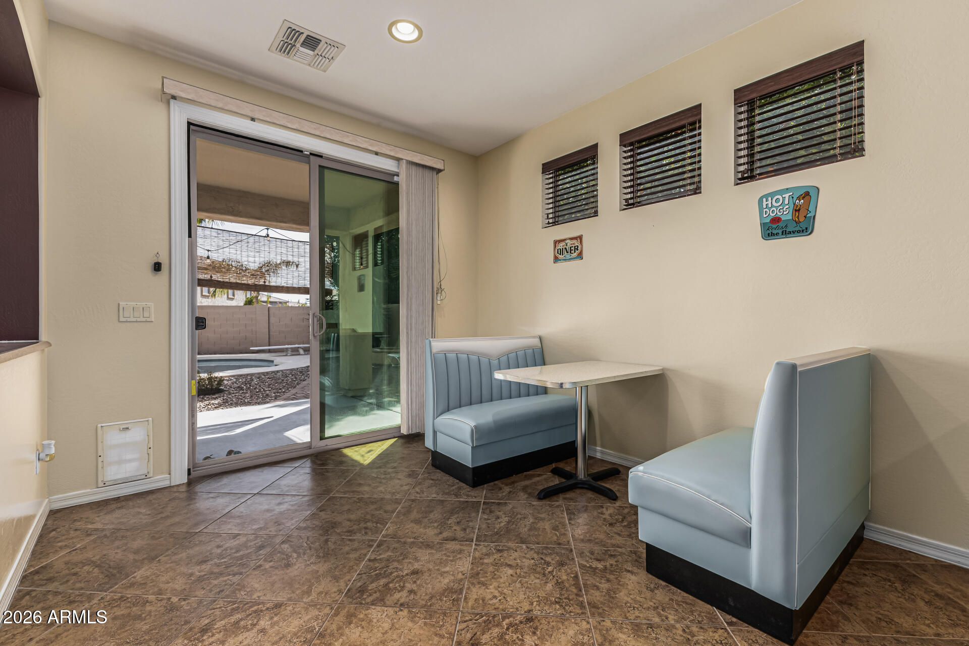 5513 West Rowel Road Phoenix, AZ 85083 - Photo 12 of 55 a living room with furniture and a window