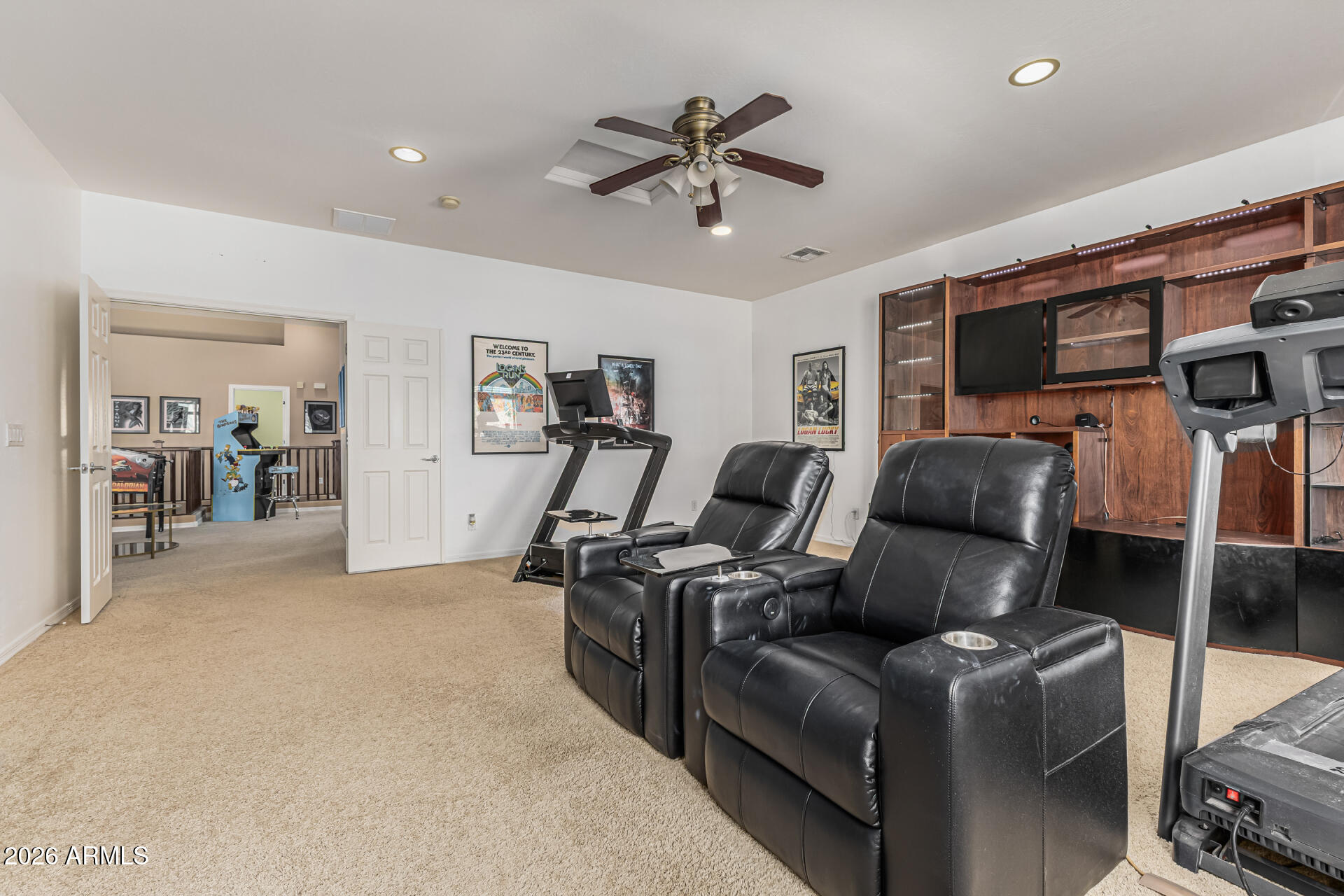 5513 West Rowel Road Phoenix, AZ 85083 - Photo 34 of 55 a living room with furniture and a ceiling fan