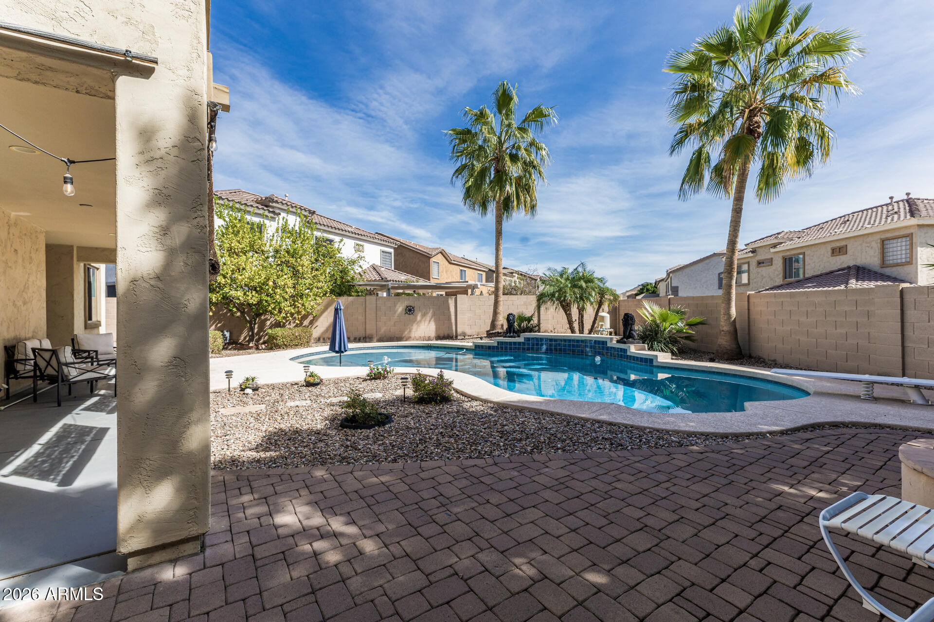 5513 West Rowel Road Phoenix, AZ 85083 - Photo 39 of 55 a view of a house with a backyard and a tub