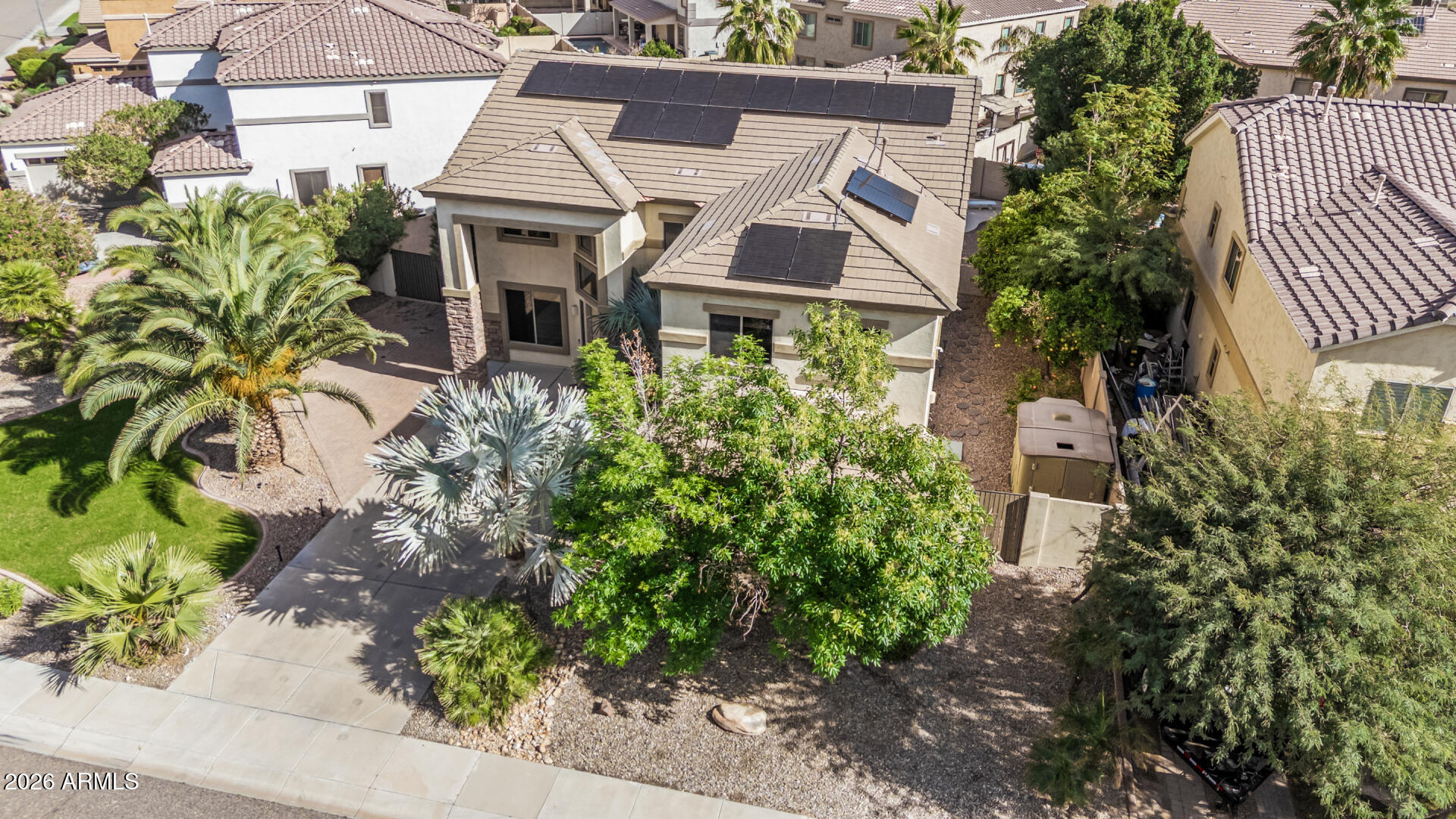 5513 West Rowel Road Phoenix, AZ 85083 - Photo 46 of 55 aerial view of a house with a yard and potted plants