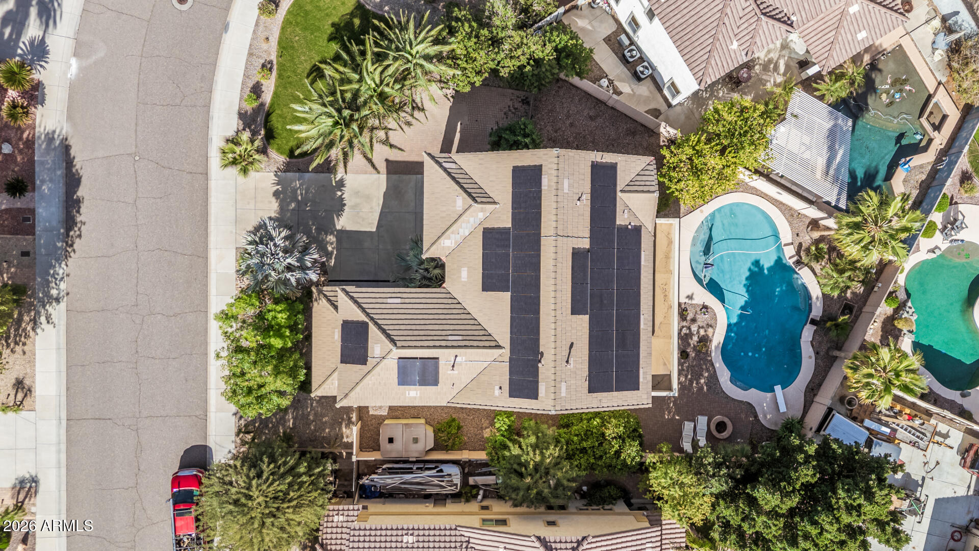 5513 West Rowel Road Phoenix, AZ 85083 - Photo 53 of 55 an aerial view of a house with a yard and potted plants