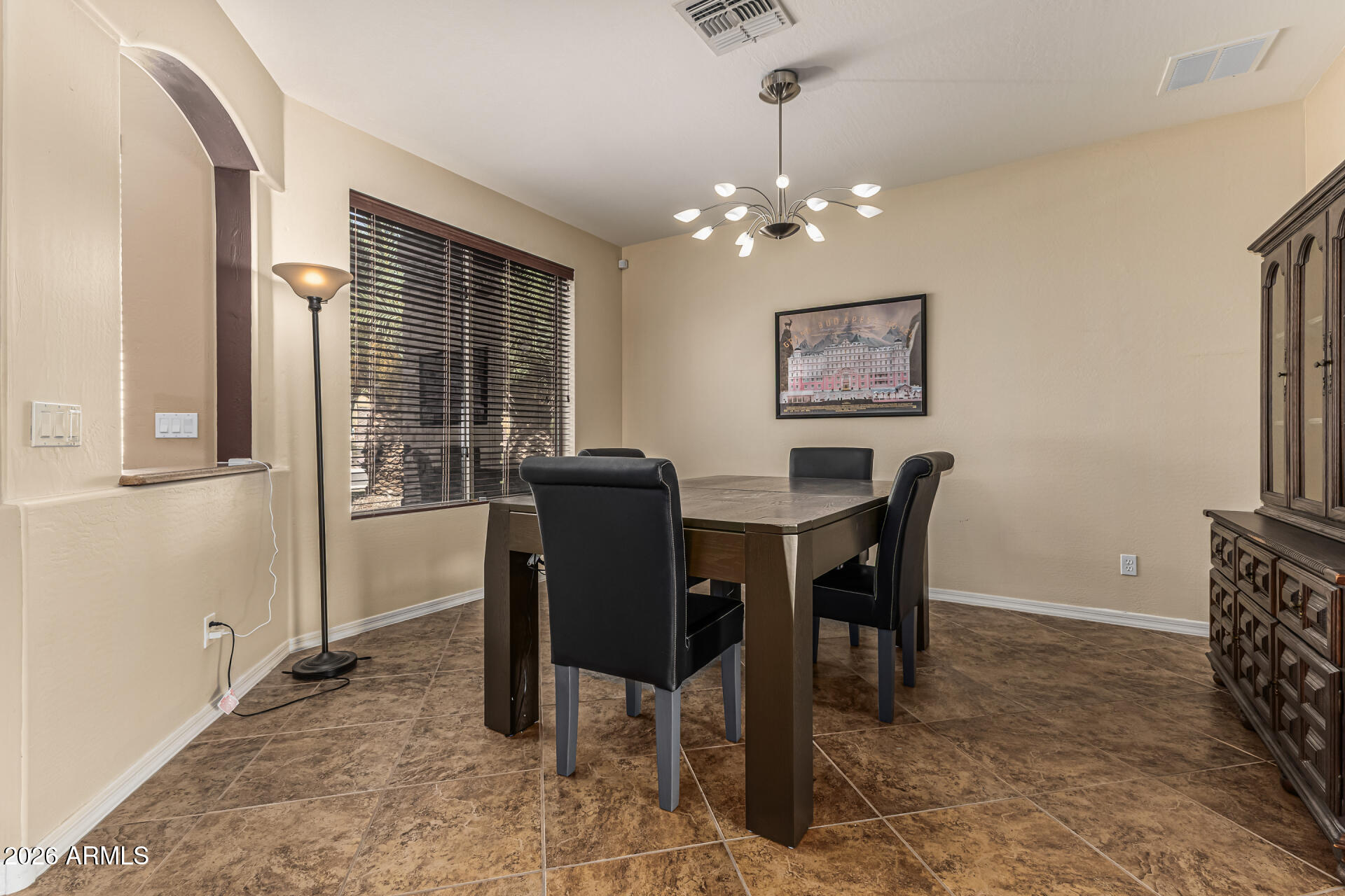 5513 West Rowel Road Phoenix, AZ 85083 - Photo 6 of 55 a view of a dining room with furniture
